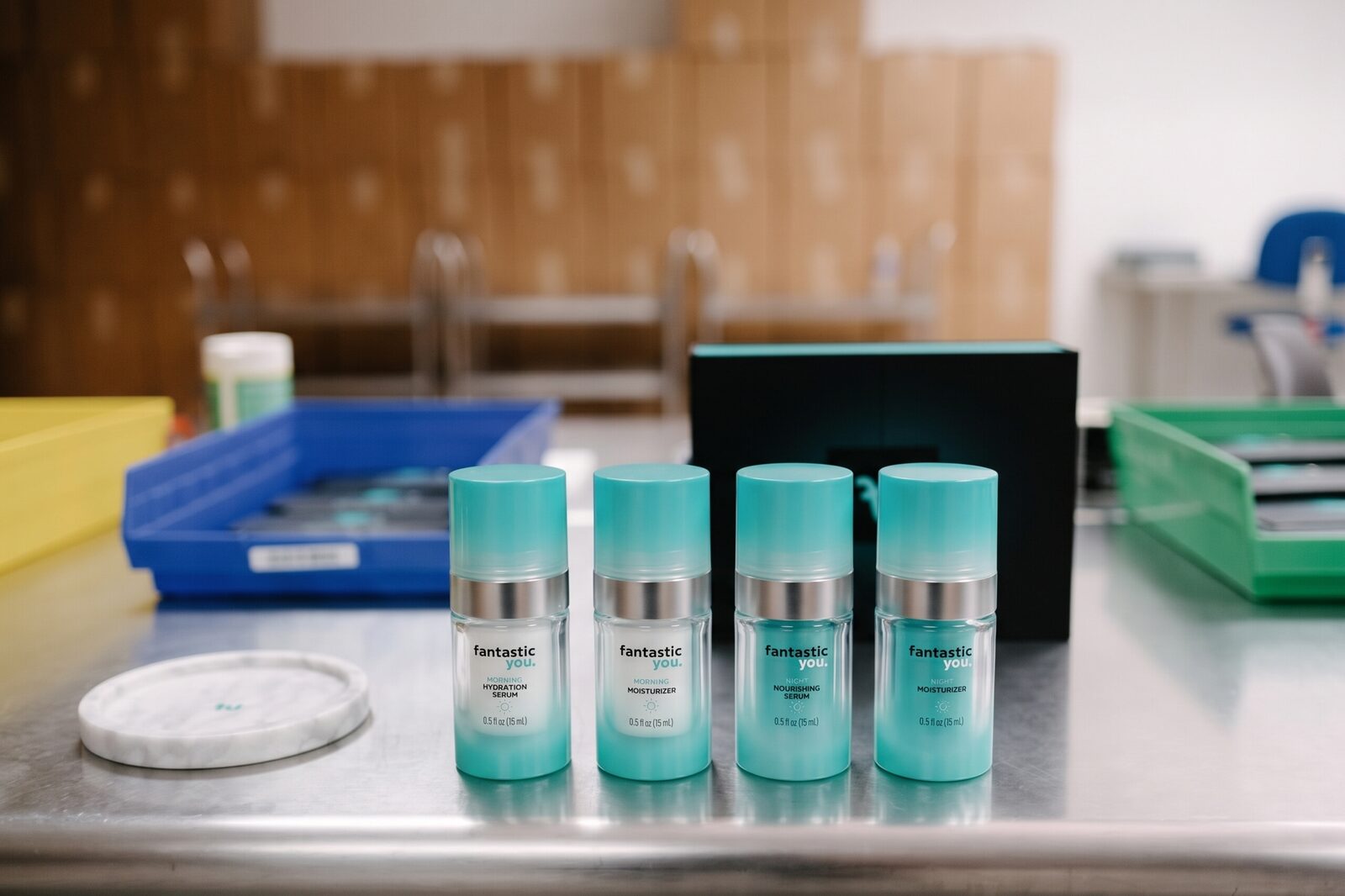 The full system beside its gift box on the packing bench